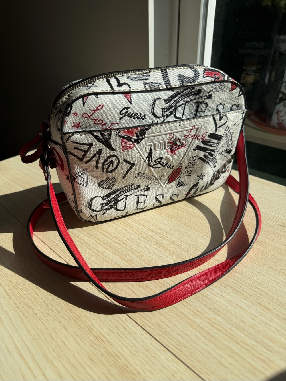GUESS White Crossbody Bag with Black Script & Red Trim